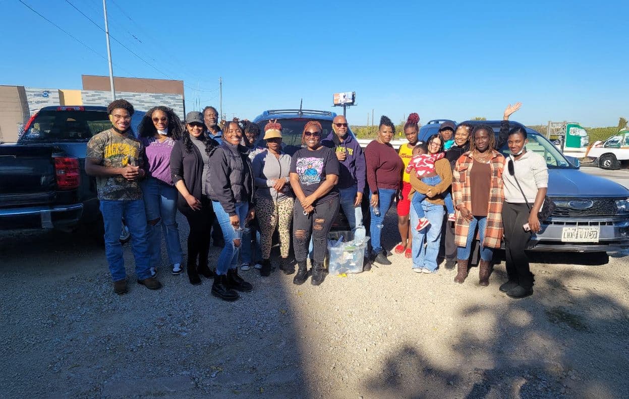 FTCC outreach volunteers gathered together for a group photo on a sunny day