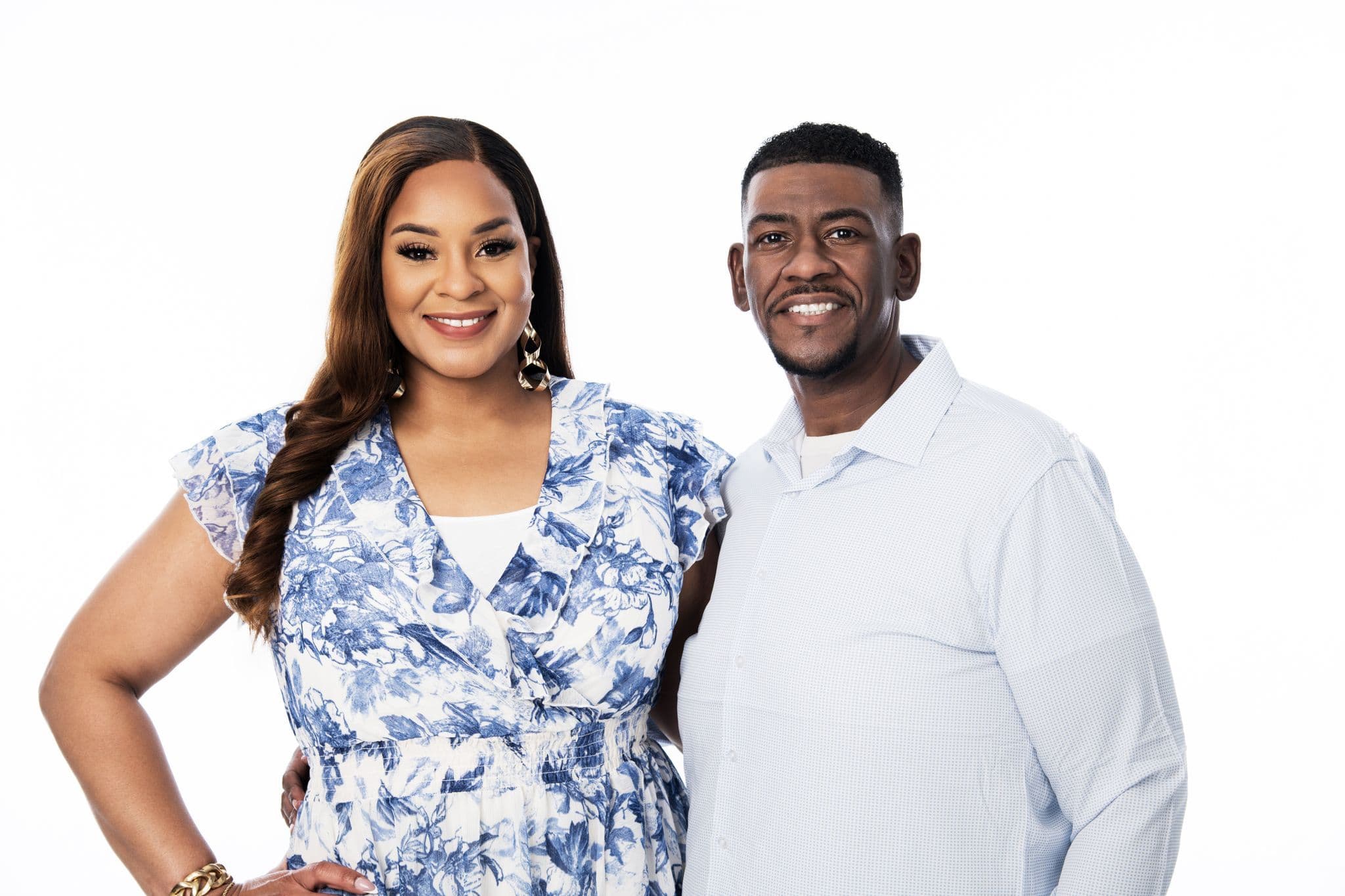 Pastor Jason White and Lady J standing side by side and smiling