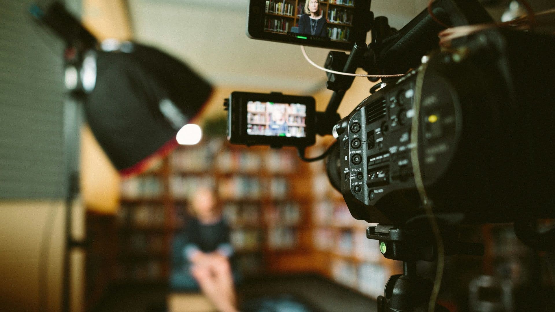 A video camera set up to record a church service
