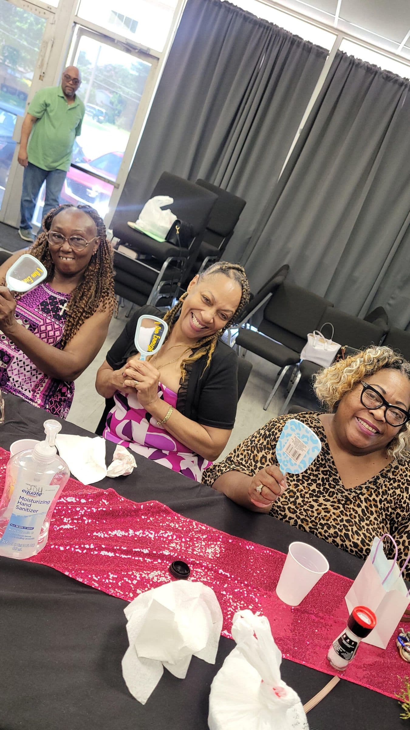 Sisters in Strength members enjoying a meal together at a decorated table