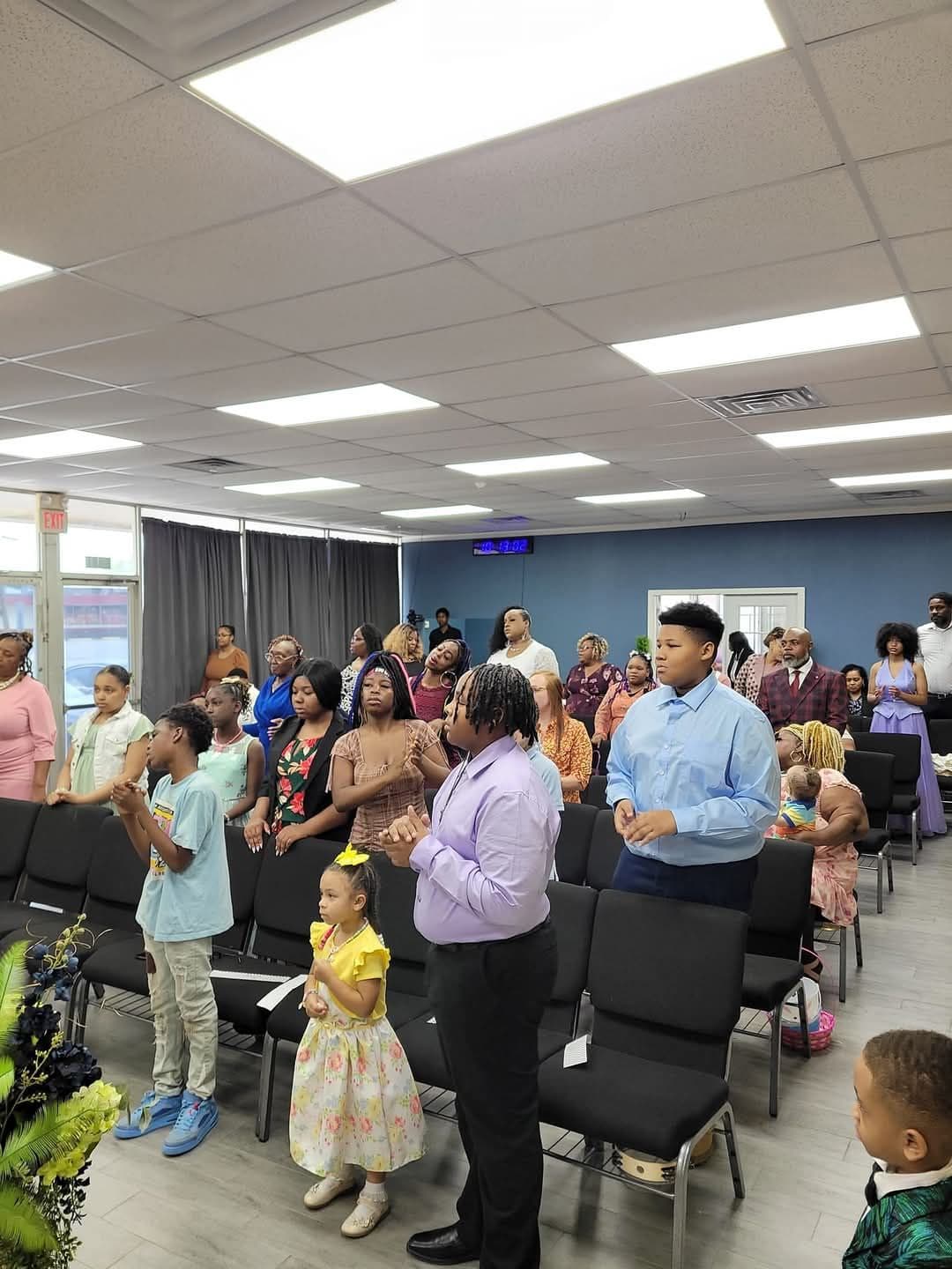 Children and families worshipping together at Faith Tabernacle Christian Church